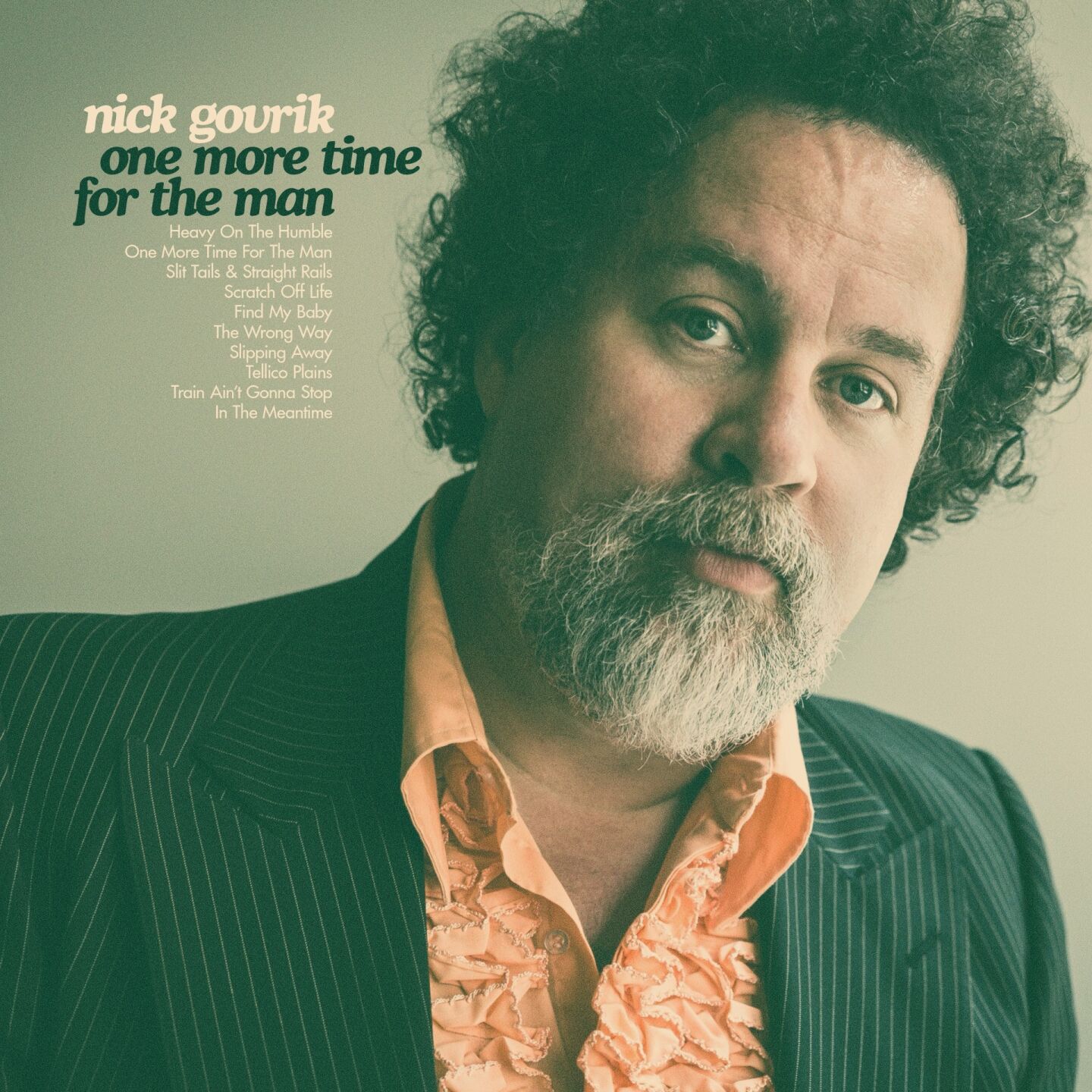 Album art Nick Govrik One More Time for the Man closeup on artist in pink shirt and dark pinstriped jacket